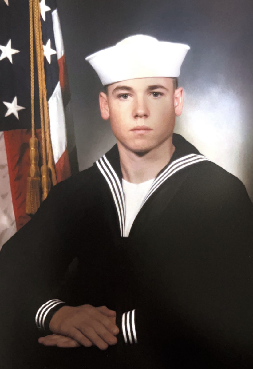 This photo was taken of Marshman in the Navy Sailor uniform. In the Navy, every Sailor recruit is photographed during Boot Camp. The photographer worked for the Navy but who they are is unknown. Marshman was 19 in this photo.