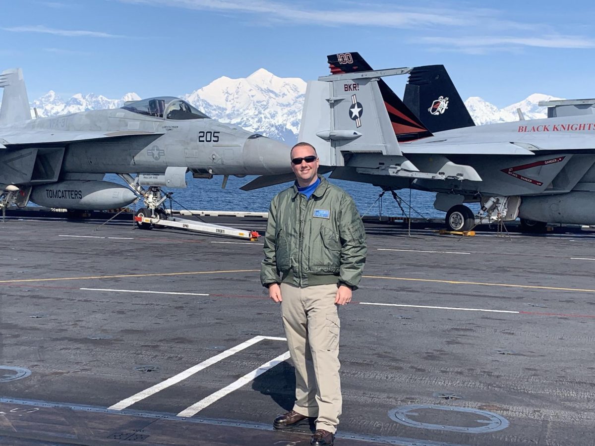 Matthew McCauley on the flight deck of the USS Theodore Roosevelt during Operation Northern Watch, off the coast of Alaska.