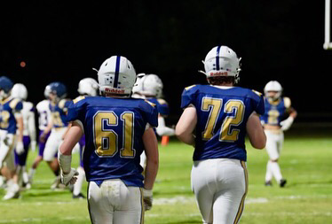 (Left to Right) Conner Peterson, Number 61, Holden Weber, Number 72.