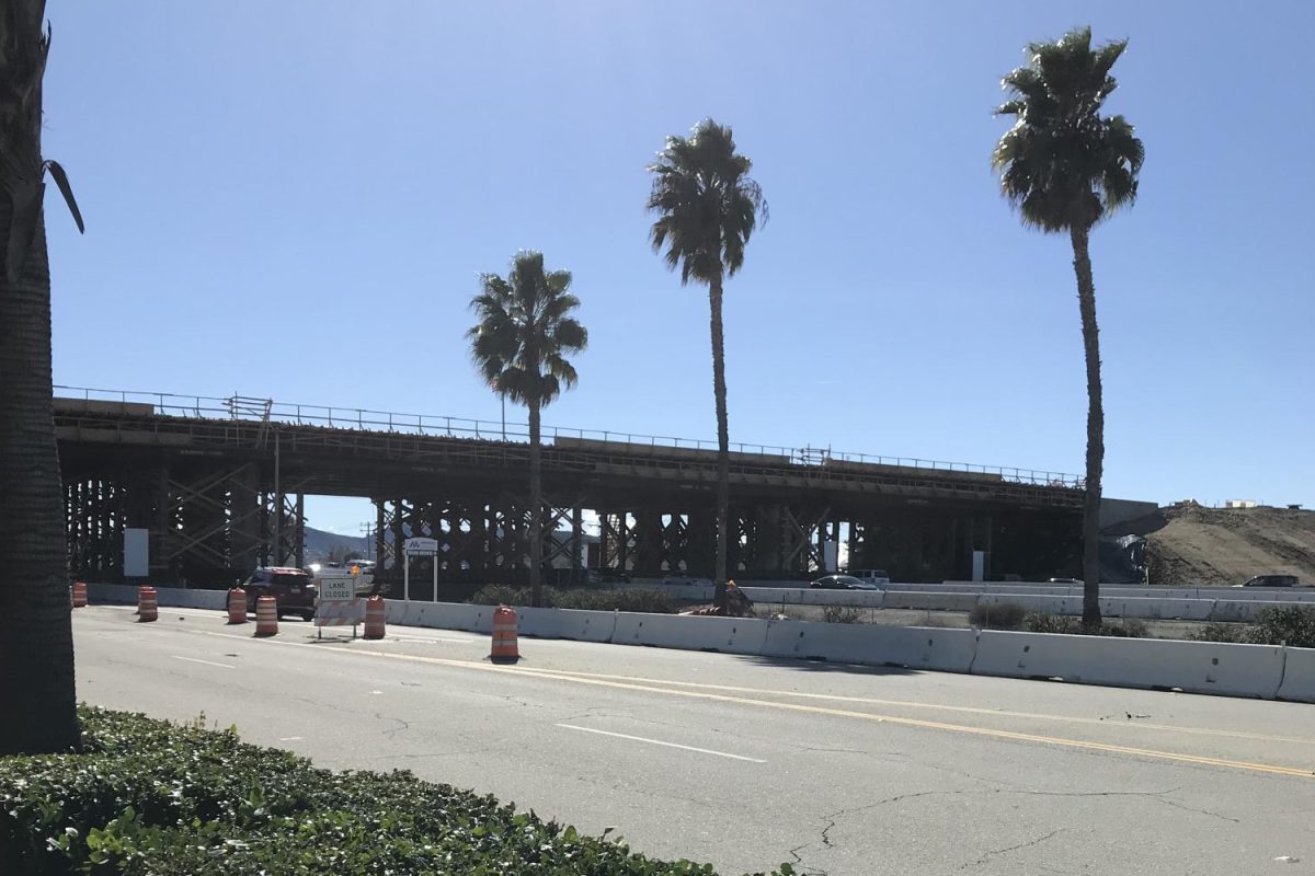The middle of the Holland Overpass from the north side of Antelope Road. There are currently wood frames on the bridge portion.