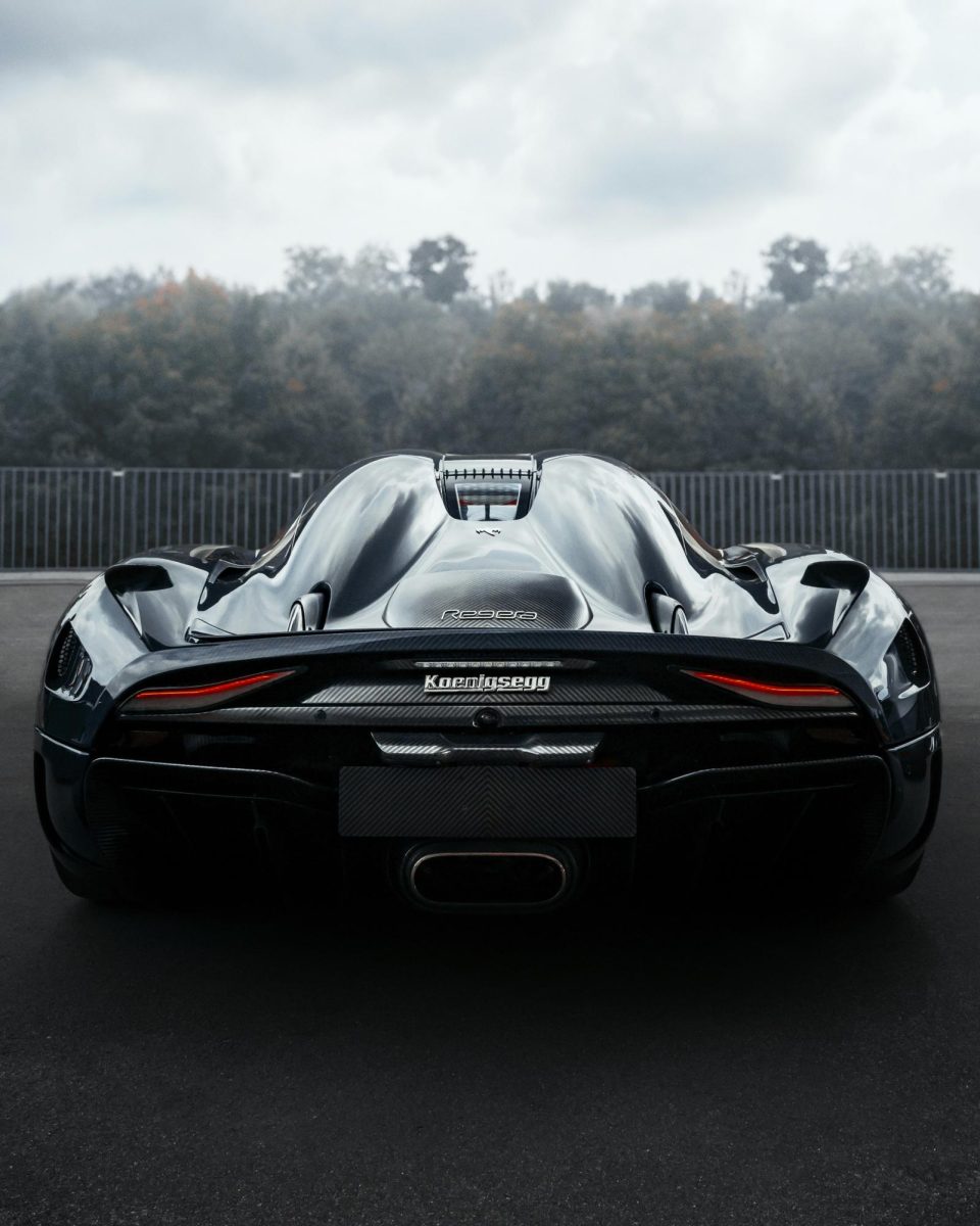 A beautiful rear photo of the Koenigsegg Regera highlighting its curved body panels and streamlined look. This production vehicle goes for 3.2 million with only 80 models produced