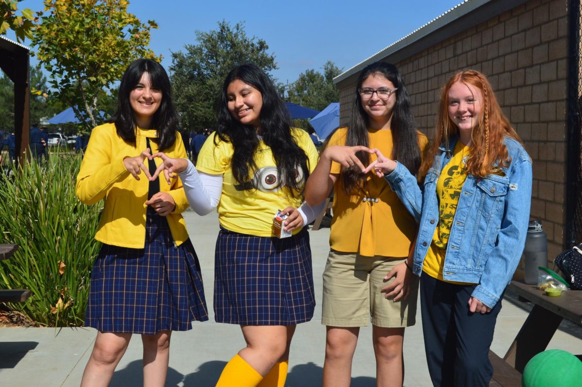 The Drugs are Despicable, Dress Like a Minion spirit day that was on Thursday, 10/26. This was part of the spirit week for Red Ribbon week.
People in the photo from left to right: Caris Lopez, Isabella Carcelen, Maria (Bella) Burns, and Jaden  Larsen.