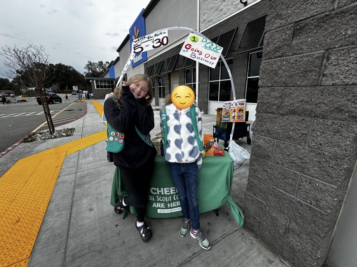 Future SRA sixth grader, Alyssa Cairns, sells cookies outside of Walmart in Lake Elsinore, CA. Ive been a part of Girl Scouts since Kindergarten and am currently working towards my Bronze Award, Cairns says. 