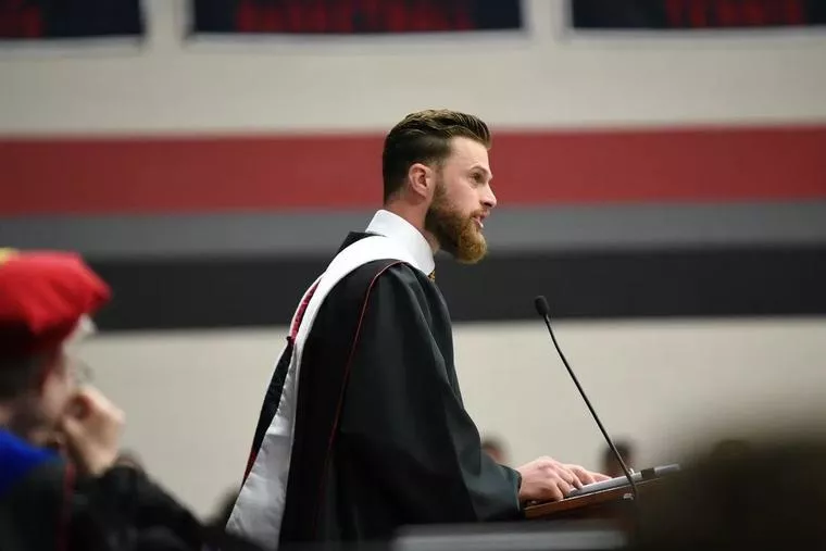 Harrison Butker has spoken as a commencement speaker for two college graduations, Benedictine College and Georgia Institute of Technology. This photo shows him during his address at Benedictine College on May 11th, 2024.