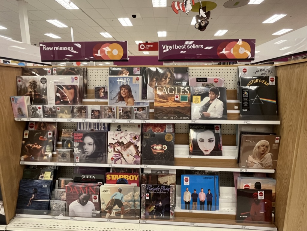 Vinyl Revival in Action: A collection of bestselling vinyl records at a local store demonstrates the continued popularity for this age-old format among both seasoned collectors and new generations