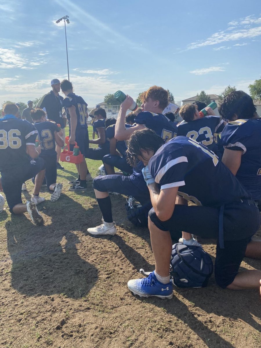 Frosh coach Steele giving a post-game speech after 26-6 Victory Over Paloma Valley High School