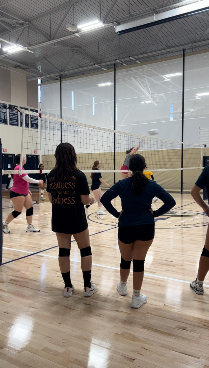 An inside look behind one of Varsity’s practices. Starting middle Abigail Pulver crushing the ball after being set by Savannah Rudas. 
