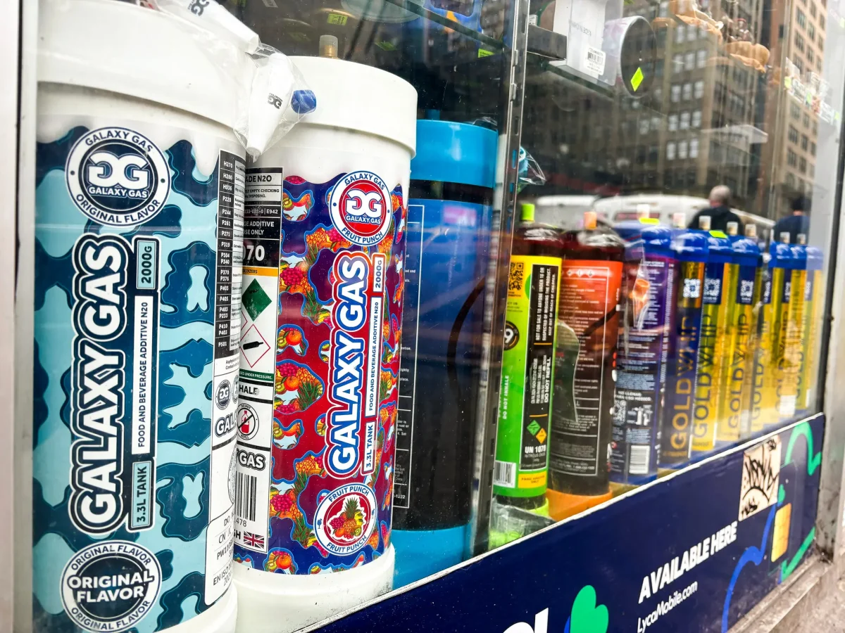 Galaxy Gas containers being displayed in a Manhattan smoke shop window.