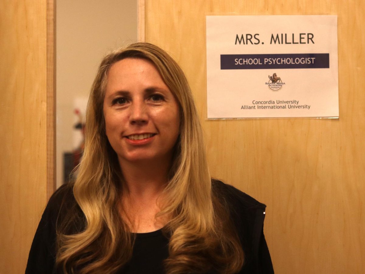 Santa Rosa Academy's psychologist outside her office, Julia Miller. Representing our school for National School Psychologist Week, and ready to give insights.