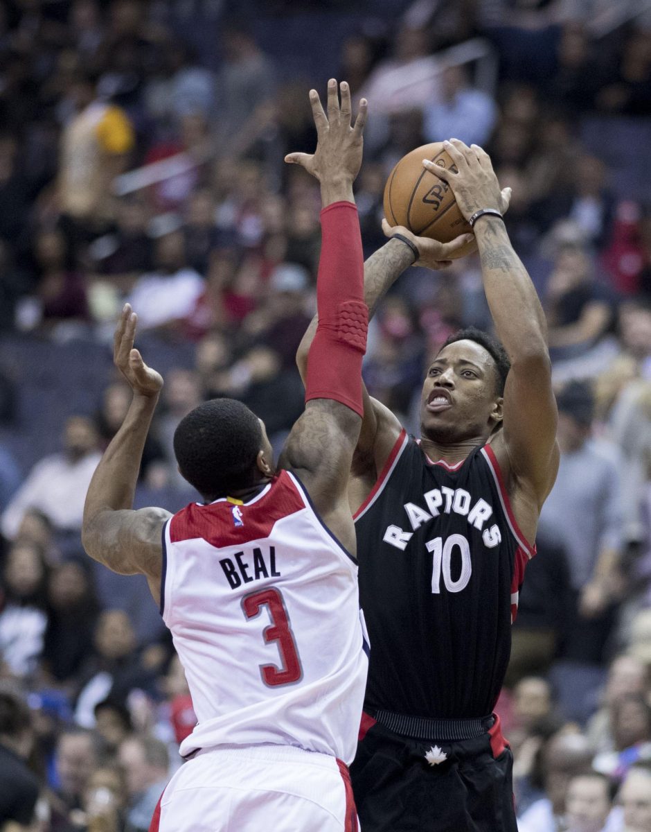 Kawai Leonard taking a shot on November 2nd 2016. In a heated game vs the Washington Wizards.