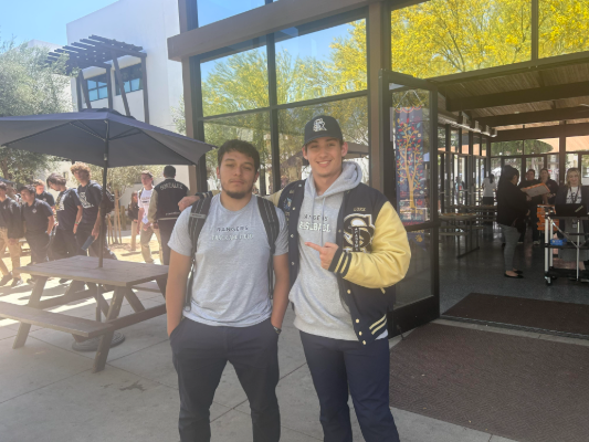 Teammates turned friends, Anthony Sullivan and Luke Hamilton pose with each-other for a quick photo.